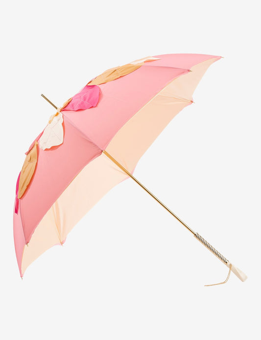 Parapluie rose avec feuilles